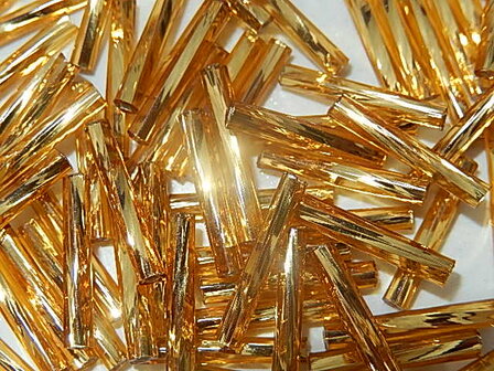 T6102 Tsjechische glaskraal 10 gr gedraaide Preciosa bugles goudgeel 15 mm