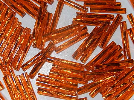T6107 Tsjechische glaskraal 10 gr gedraaide Preciosa bugles oranje 15 mm