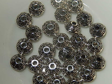 M0101 Tibetaans zilveren tussenkraal 1 st bicone 4x7 mm 