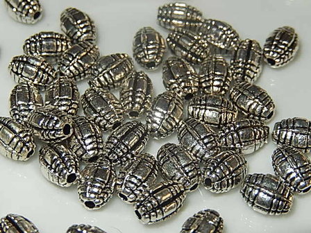 M0106 Tibetaans zilveren kraal 1 st ovaal 7x5 mm